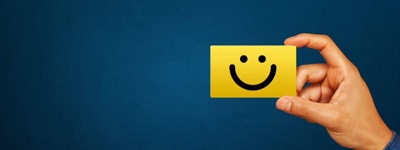 A card with a smile drawn on it