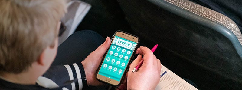 Someone using an app at an event