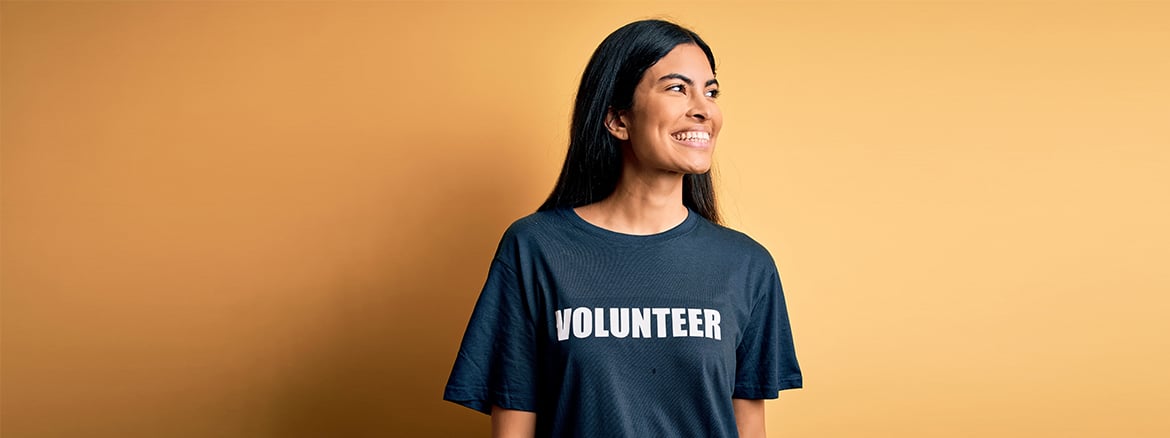 A person wearing a volunteer tshirt